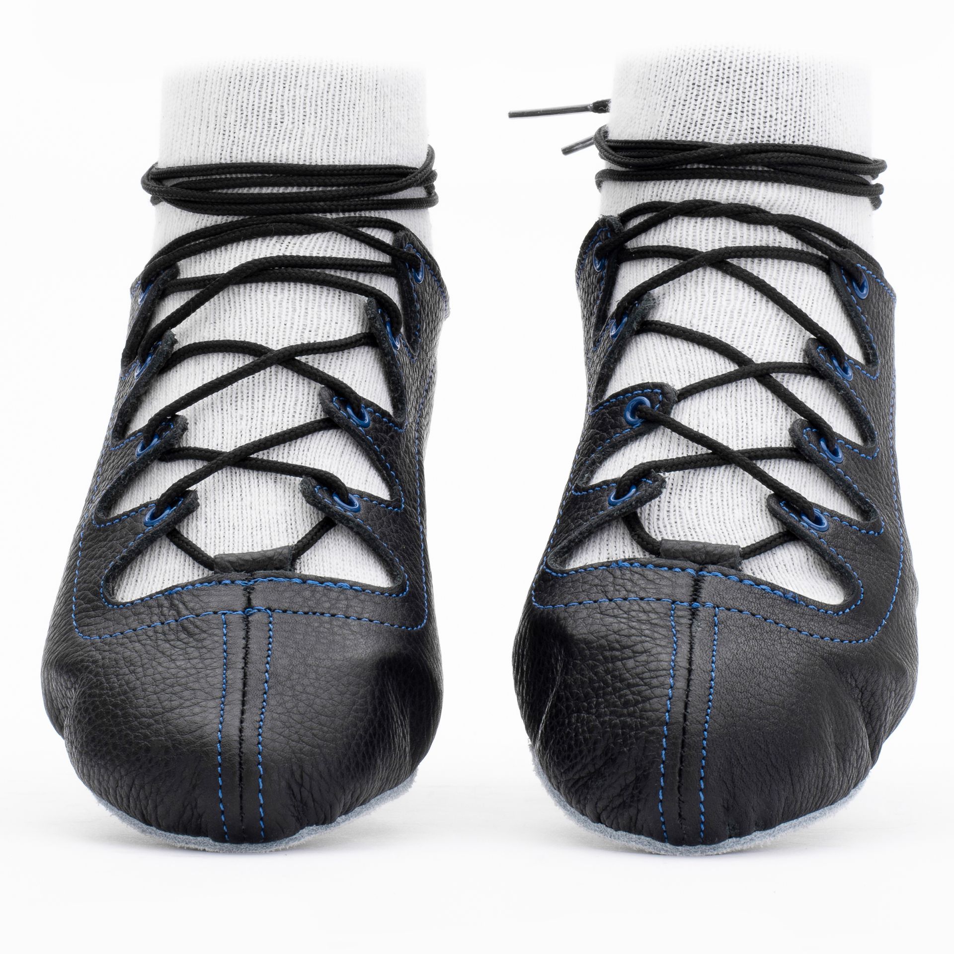 Black leather Glenshee Blue Highland dance pumps with blue stitching, 4-finger lace system, front seam with loop, extra ankle eyelet, shock-absorbing insoles, and flexible chrome suede sole.