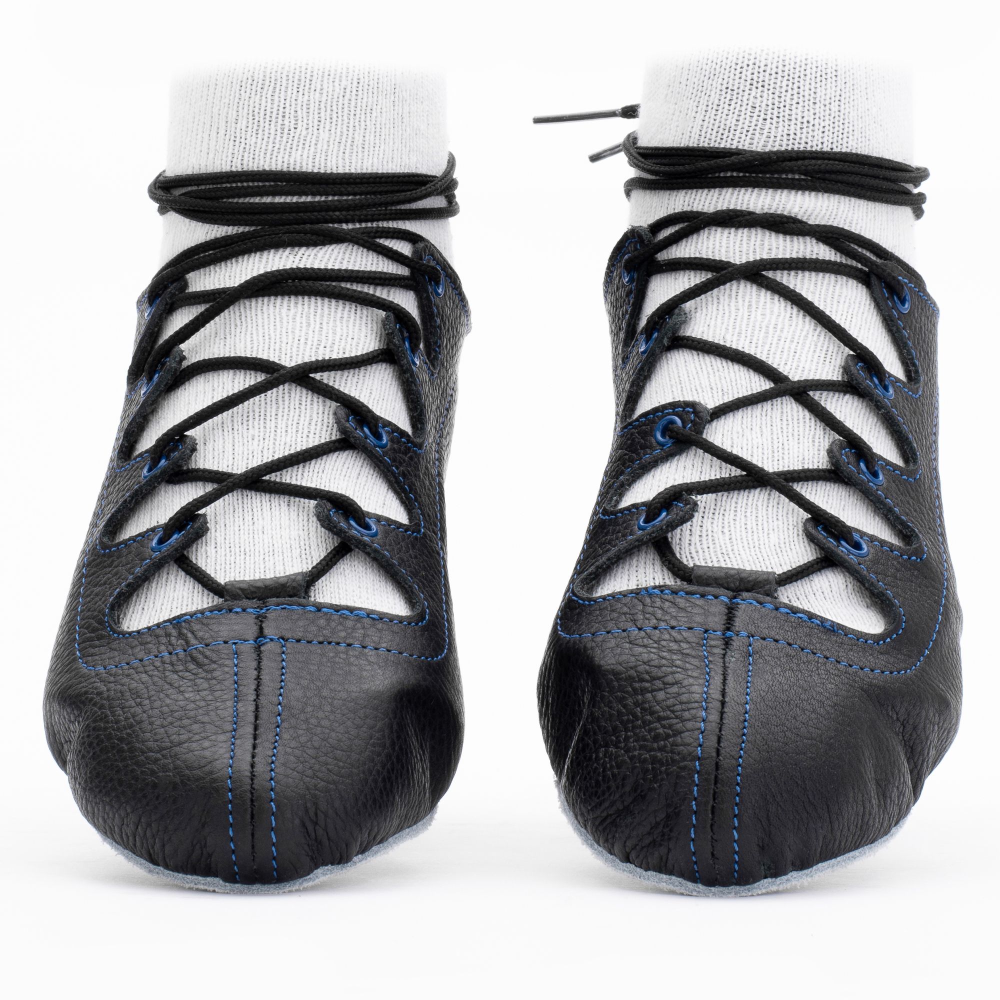Black leather Glenshee Blue Highland dance pumps with blue stitching, 4-finger lace system, front seam with loop, extra ankle eyelet, shock-absorbing insoles, and flexible chrome suede sole.
