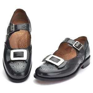 Black leather buckle brogue with perforated detailing, polished finish, and Blake-stitched leather sole.