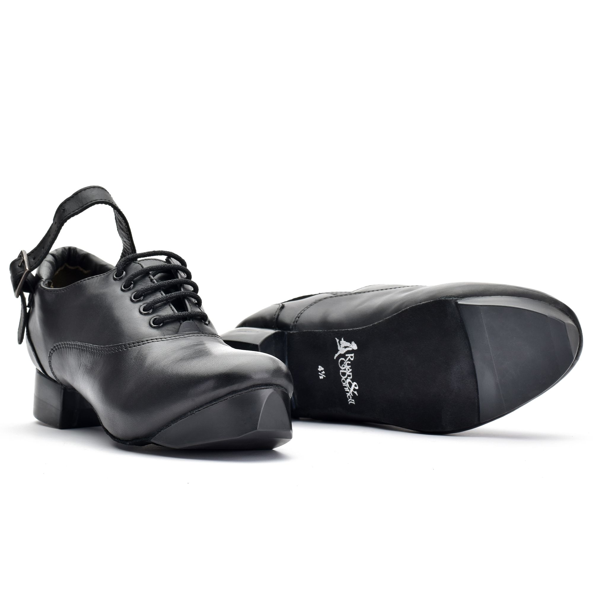 Black leather Irish dance hard shoe with 5-eyelet lace-up design, padded heel collar, and lightweight construction featuring advanced honeycomb-moulded heel and toe tips.