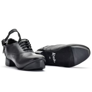 Black leather Irish dance hard shoe with 5-eyelet lace-up design, padded heel collar, and lightweight construction featuring advanced honeycomb-moulded heel and toe tips.