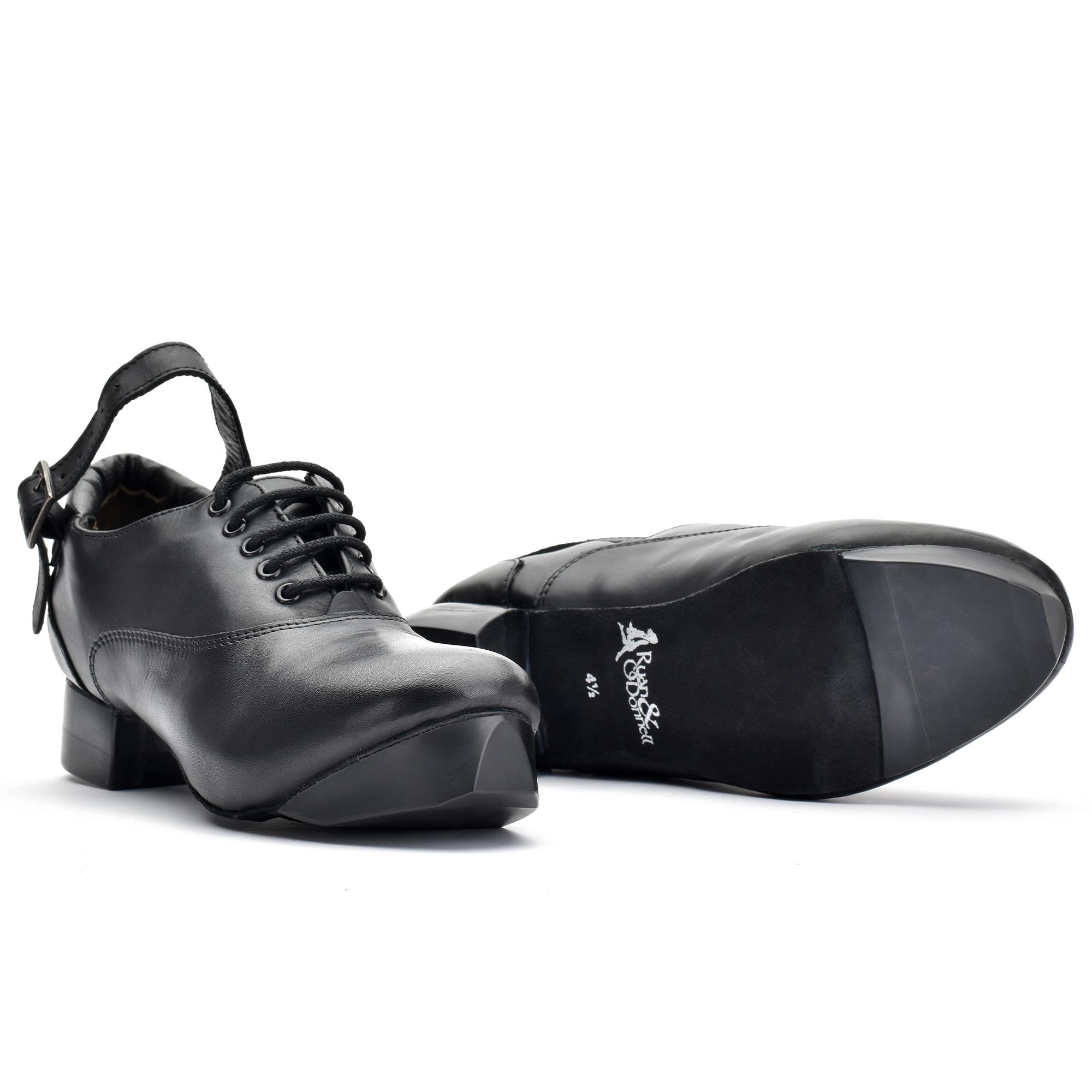 Black leather Irish dance hard shoe with 5-eyelet lace-up design, padded heel collar, and lightweight construction featuring advanced honeycomb-moulded heel and toe tips.