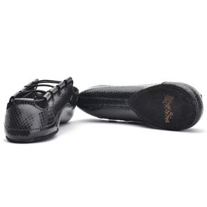 Black leather Irish dance pumps with a striking diamond print pattern, featuring a gel-cushioned insole and Noene toe protection for enhanced comfort and durability.