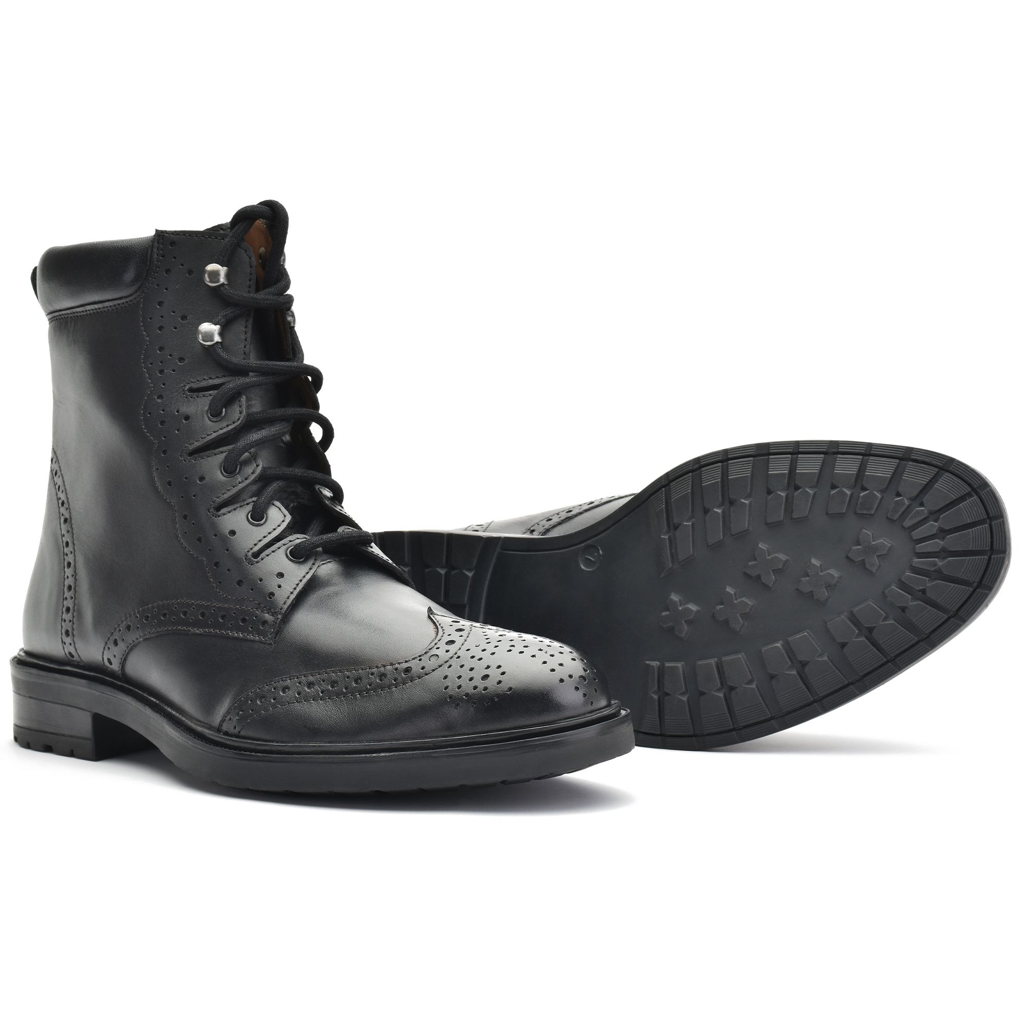 Black leather Ghillie Boot with perforated brogue detailing, long wraparound laces, padded leather cuff, and a rugged rubber commando sole.