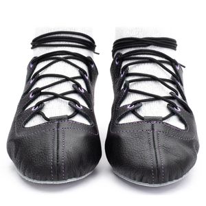 Black leather Glenshee Purple Highland dance pumps with purple stitching, 4-finger lace system, front seam with loop, extra ankle eyelet, shock-absorbing insoles, and flexible chrome suede sole.