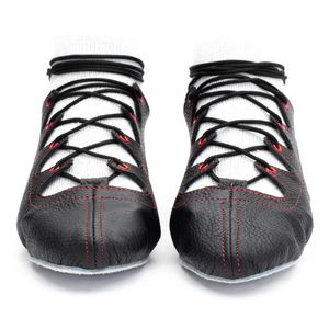 Black leather Glenshee Red Highland dance pumps with red stitching, 4-finger lace system, front seam and loop, extra ankle eyelet, and flexible chrome suede sole